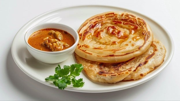Roti canai khas Aceh dengan kuah kari. Roti canai khas Aceh dengan kuah kari.